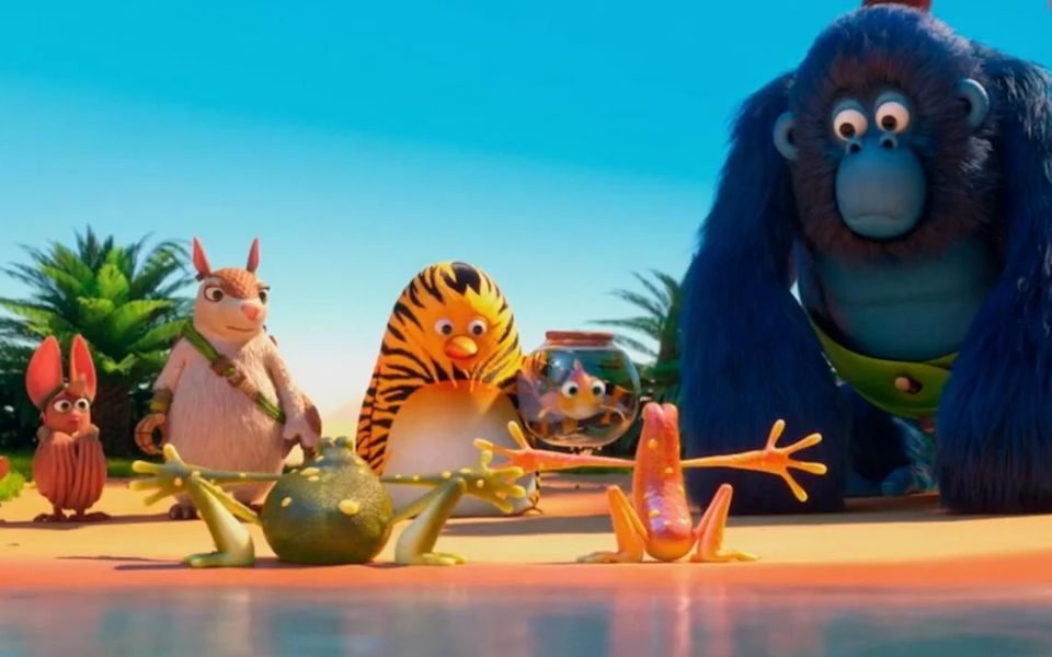 A still from The Jungle Bunch World Tour including an animated bat, armadillo, tiger-striped penguin, goldfish and a blue gorilla in a small tank, all looking at two frogs with their arms out and their backs to the camera.