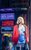 Pretty Woman: The Musical Amber Davies as Vivian Ward wearing a red blazer, blue skirt and white crop top with a short blonde wig in Pretty Woman: The Musical