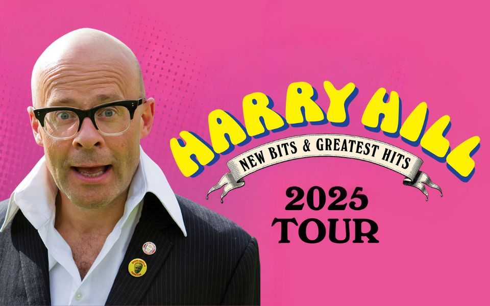 Image of Harry Hill in his classic suit and white casual shirt combo against a pink background. Text reads Harry Hill: New Bits and Greatest Hits. 2025 tour.