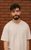 Ashley Pekri. Credit Chris Coote An actor poses for his headshot in a white t-shirt