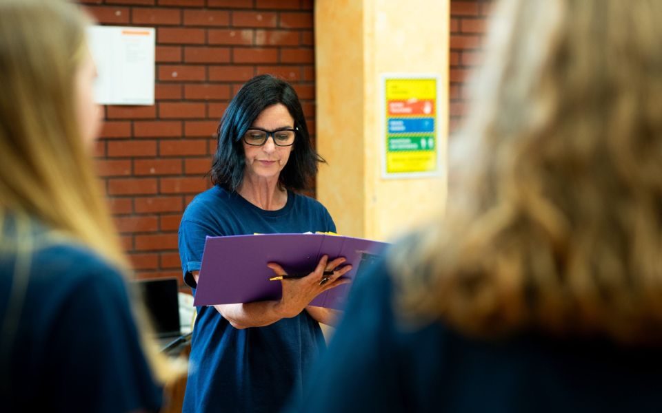 Lizi leading a rehearsal