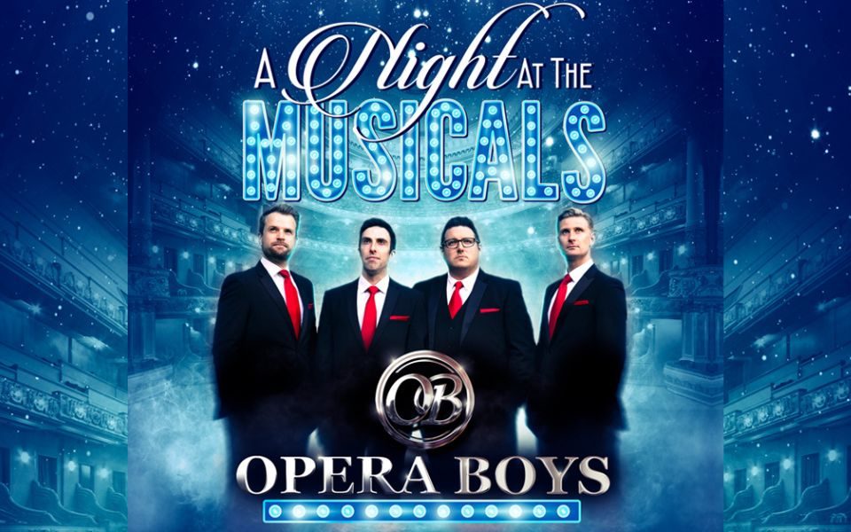 The Opera Boys in black suits and red ties in front of a blue-toned image of a theatre auditorium. Text reads: A Night at the Musicals. Opera Boys.