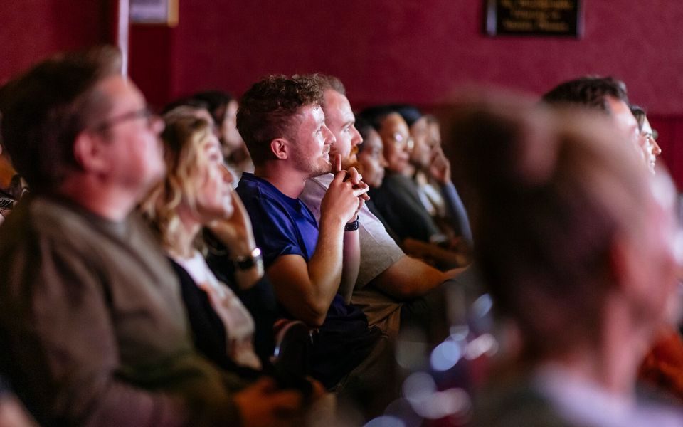 A City Varieties audience concentrating on what's happening on the stage.