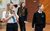 Students in Studio. Credit Ant Robling Three students in uniform look past the camera towards a facilitator during a drama exercise in the Studio