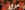 Newsletter Summer 2025 Two teenagers sit in the auditorium of Leeds Grand Theatre, they are laughing.