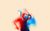 The Maladies Two figures dancing blurring into one image. One figure has a red filter, the other has a blue one.