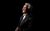 Tony Christie Tony Christie in a patterned suit smiling and facing to his right.