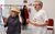 By Royal Appointment Anne Reid wearing a nude hat and James Reid standing next to her in the rehearsal studio.