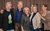 By Royal Appointment Cast The company of By Royal Appointment with their arms around each other and smiling at the camera.
