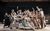 Fiddler on the Roof Ensemble bundled together, looking shocked