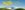 Picturesque landscape of snow-capped mountains and luscious green grass with clear blue sky. Text reads: The Sound of Music. Music by Richard Rodgers. Lyrics by Oscar Hammerstein II. Book by Howard Lindsay and Russel Crouse. Suggested by 