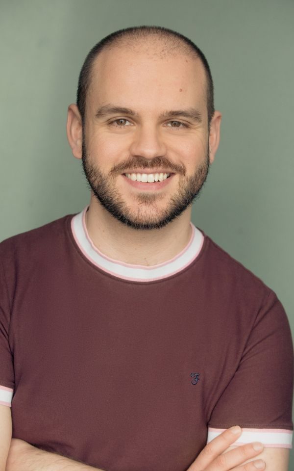 Headshot of Tom Benjamin