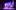 Students posing as if singing into microphones on stage at City Varieties with blue and purple lights on them.