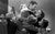 It's a Wonderful Life Black and white still from It's a Wonderful Life. James Stewart smiles at a beaming Donna Reed, surrounded by children who hug them and cling to his overcoat.