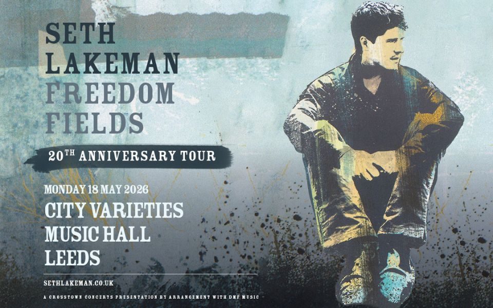 Illustration of Seth Lakeman sat in a crouched position surrounded by paint splatters on a turquoise watercolour background. Text reads: Seth Lakeman. Freedom Fields. 20th Anniversary Tour. Monday 18 May 2026. City Varieties Music Hall Leeds. SethLakeman.co.uk