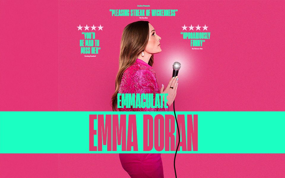 Emma Doran, in profile, holds a glowing microphone with hands in a prayer position and looks upwards. She is wearing an embroidered pink jacket in front of a bright pink background. Text reads: 'Pleasing streak of wickedness'. 4 stars. 'You'd be mad to miss her'. 4 stars 'Uproariously funny'. Emmaculate. Emma Doran.