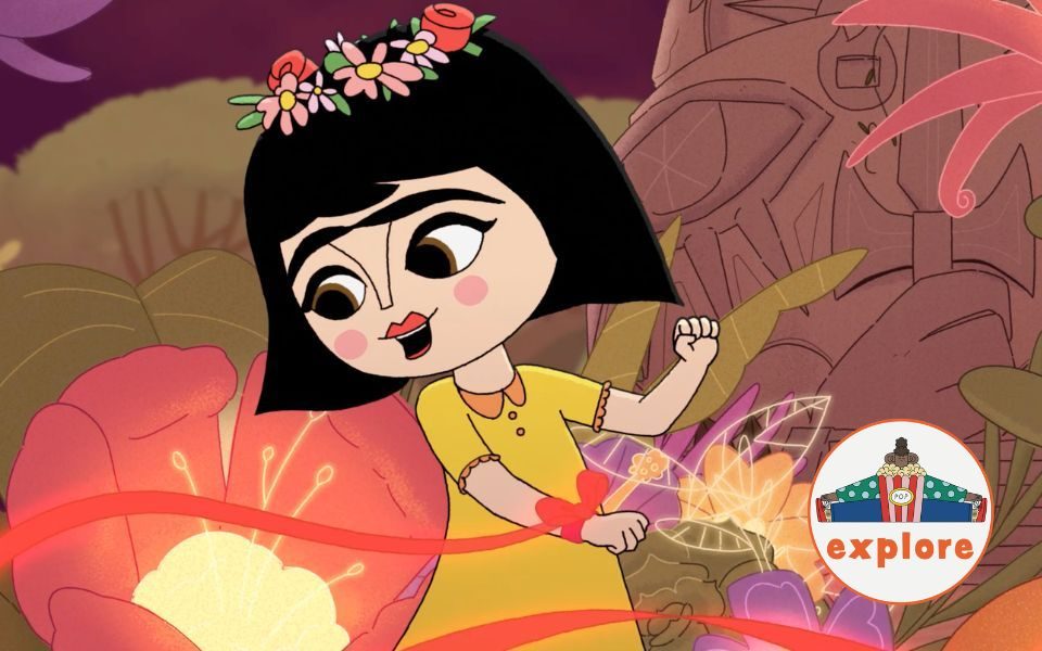 Animated still of a character resembling Frida Kahlo, wearing a wreath of flowers on her head and swaying her arms in a fantastical forest landscape. In the bottom right corner, a roundel featuring a playful illustration of a person sat peering over a bucket of popcorn, on the word 'explore'.