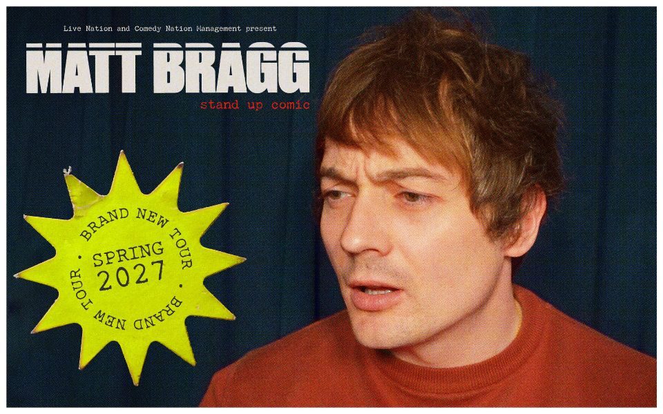Matt Bragg squints with his mouth partially open, looking off camera in an orange jumper in front of a navy curtain backdrop. Text reads: Live Nation and Comedy Nation Management present Matt Bragg: Stand Up Comic. In a yellow star, more text reads: Brand new tour. Spring 2027.