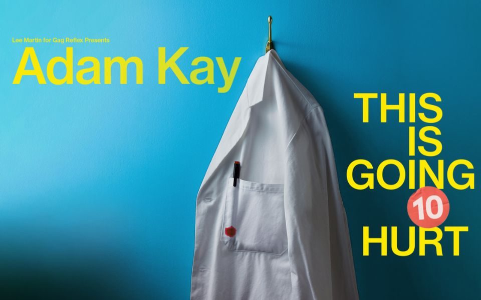 Against a blue backdrop, a white lab coat hangs on a clothes hook. It has a pen leaking red ink in the chest pocket. Text reads: Lee Martin for Gag Reflex presents: Adam Kay: This is Going '10' Hurt.